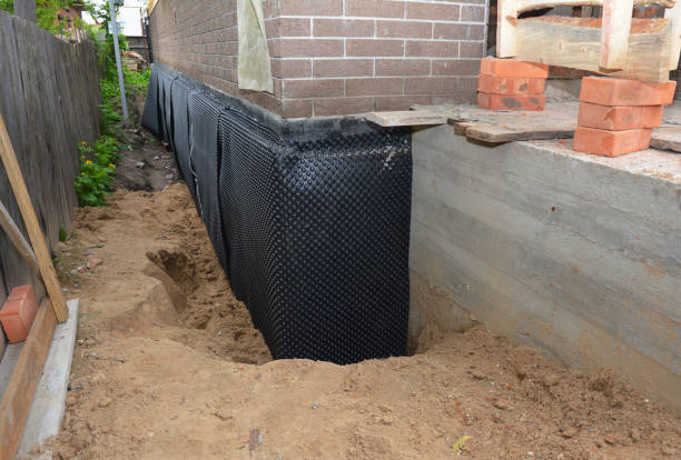 SJ Waterproofing Pros technician performing targeted Foundation Crack Repair assessment in Saint Paul, MN